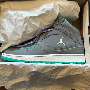 Grade school, Jordans, in purple and teal.